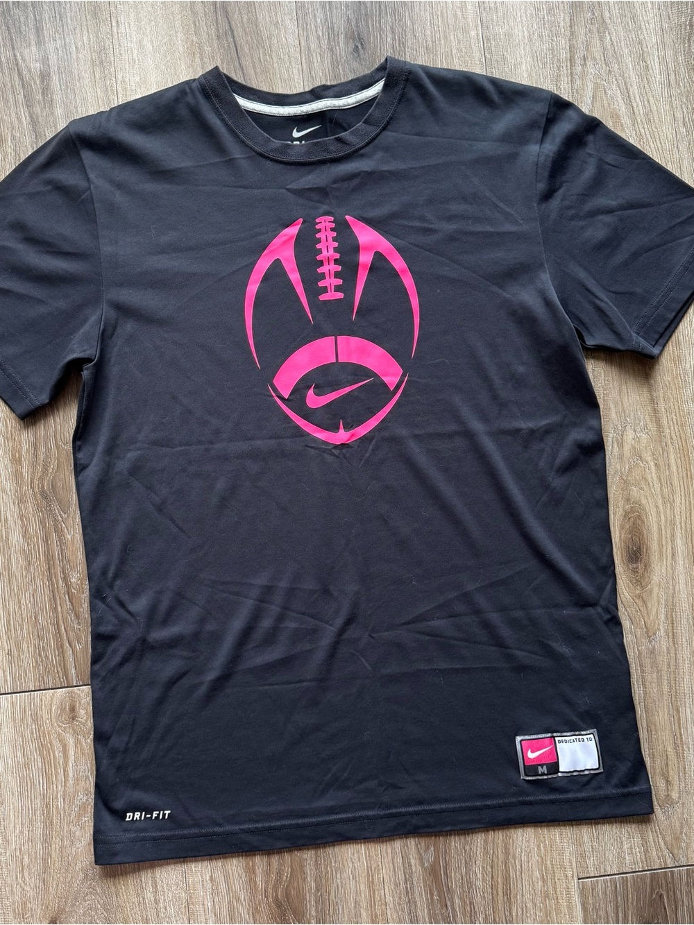 Nike Black Short-Sleeve Dri-FIT T-Shirt with Pink Football Graphic
